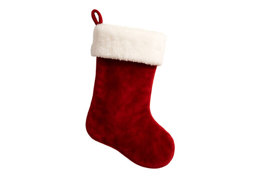 A textured red velvet christmas stocking with a wide white furry cuff and hanging loop, awaiting small gifts and treats from santa claus, isolated on transparent background