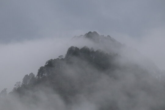 Scenic beauty of KarnPrayag enroute to Badrinath, with foggy hills,  hill & river-side tourist resorts. Badrinath is a famous Hindu tourist and pilgrimage place near the Himalayas.
