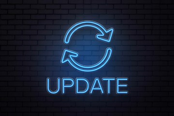 Blue neon update sign with refresh arrows on brick wall