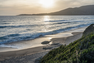 Sunset at Santana Beach view Golf at Sagone Corsica France beautyful sand Beach boats mountain village Tourism concept