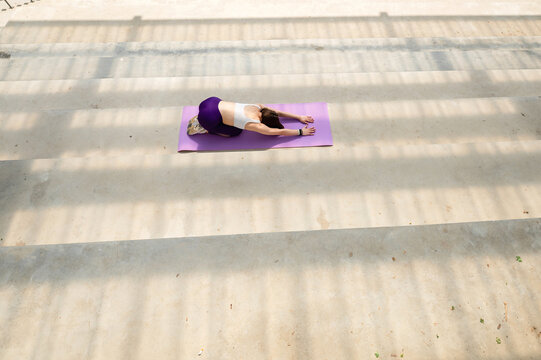 Yoga Practice in Outdoor Stadium