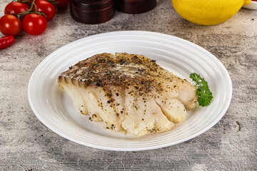 Baked cod fish fillet with spices