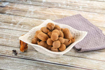 Tropical exotic Tamarind fruit heap