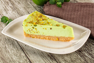 Green pistachio cheesecake served mint