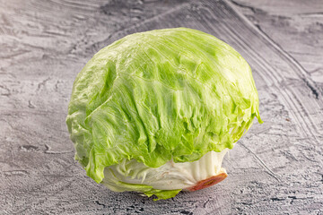 Obraz premium Raw iceberg salat over background