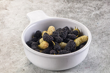 Ripe sweet juicy black and white mullberry