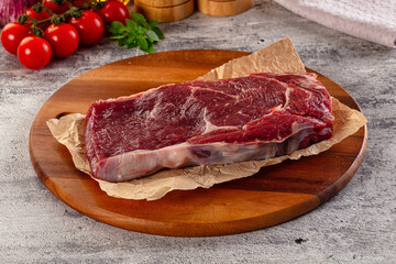 Gourmet raw rib eye steak