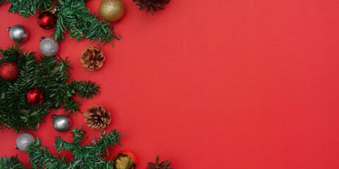Festive Christmas background with ornaments and pinecones