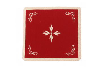 Playing card back with red pattern and decorative white scrollwork, classic gambling game element