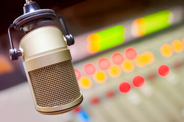 Professional microphone and sound mixer in radio studio