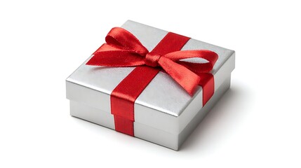 Gift box with red ribbon sits on white. Use for holiday, celebration, birthday, special occasion marketing or design.