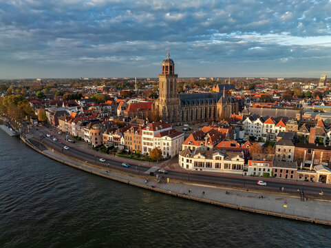 Aerial view of the Lebuinus Church rising majestically over the old town, its spire piercing the sky, Deventer, Overijssel, Netherlands.