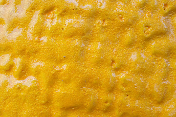 Gold ceramic surface texture background close up