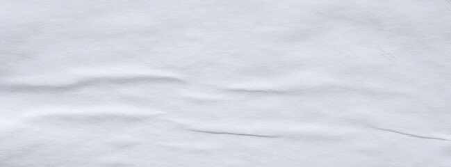 Blank white crumpled and creased paper poster texture background