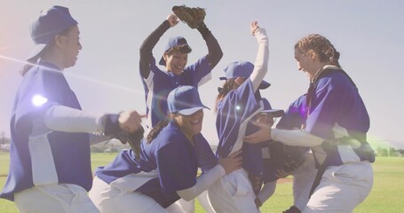 Celebrating baseball players at sports field, with baseball gloves, caps, jerseys and white pants