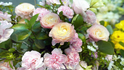 Elegant wedding bouquet with pink and white roses, lilies and lush greenery floral arrangement for special occasions