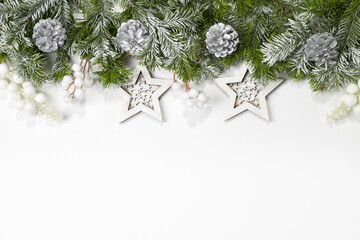 Christmas card with fir branches and Christmas decorations