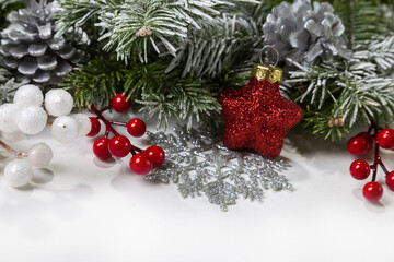 Christmas card with fir branches and Christmas decorations