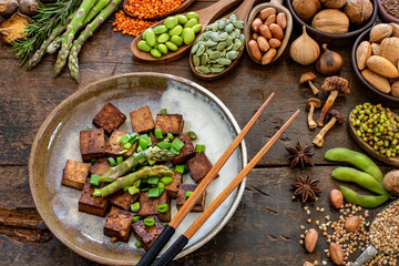 Healthy vegan salad bowl with fried tofu 