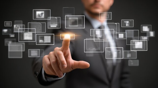 Businessman interacting with digital interface of floating holographic icons and futuristic touchscreen technology in office environment