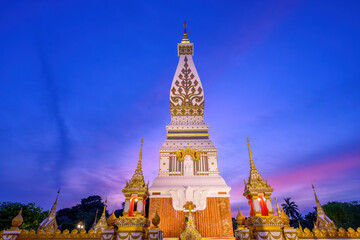Naklejka premium The beautiful Phra That Phanom at twilight at Wat Phra That Phanom, That Phanom District, Nakhon Phanom, Thailand.