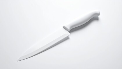 White knife, handle and blade, angled on clean white backdrop