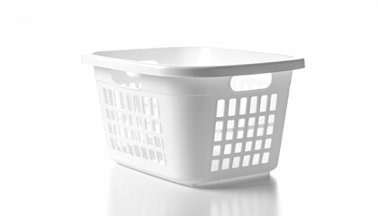 Plastic white laundry basket with handles on white surface