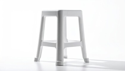 Simple white plastic stool against a bright white background
