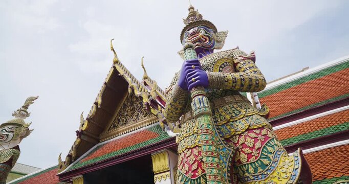 Giant golden guardian statue in Wat phra kaew attraction travel destination Bangkok Thailand