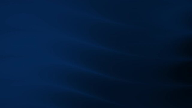 Cinematic abstract motion background featuring deep blue tones and soft, undulating light patterns, creating a fluid digital texture