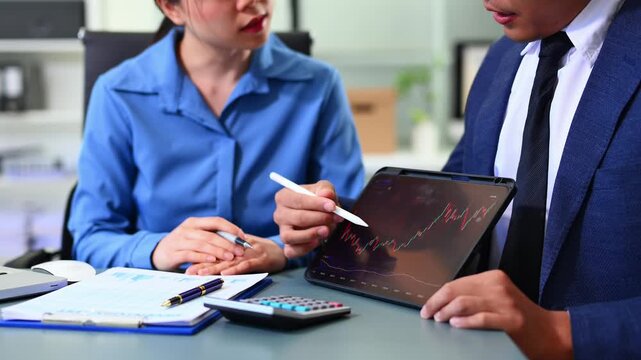Two stock traiders making analysis of digital market and investment in block chain crypto currency. Stock trade concept