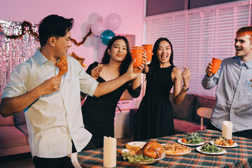 Diversity, dinner and group of people toast celebration together at party. Friends, happy and celebrate with food, wine and friendship for love, support and cheers champagne at business function