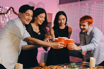 Diversity, dinner and group of people toast celebration together at party. Friends, happy and celebrate with food, wine and friendship for love, support and cheers champagne at business function