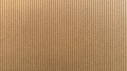 Light brown seamless kraft paper texture banner background ideal for packaging and handmade items.