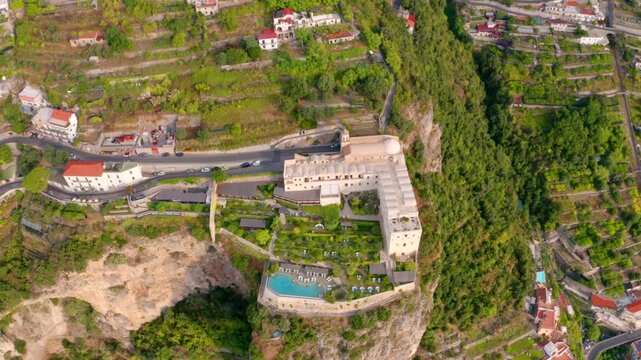 4K aerial - a bird's eye view&nbsp;video (Ultra High Definition) of Santa Maria di Grado palace, located on the huge cliff on Mediterranean coast of Italy. Picturesque summer scene of italian countryside.
