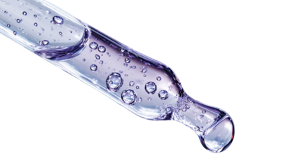 Dropper tip with liquid and bubbles against a black background