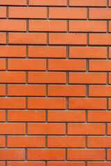 Geometric texture of red brick wall background surface. High quality photo