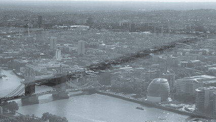 Monochrome aerial view of London city and Thames river.
