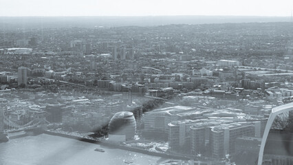 Monochrome aerial view of London city and Thames river.