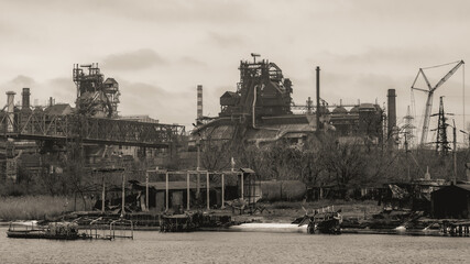 sunken and broken ships in a destroyed port in Ukraine during the war