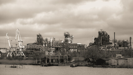 sunken and broken ships in a destroyed port in Ukraine during the war