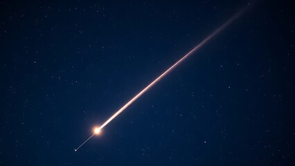 Fototapeta premium A brilliant meteor streak with a glowing tail in a star-filled night sky.