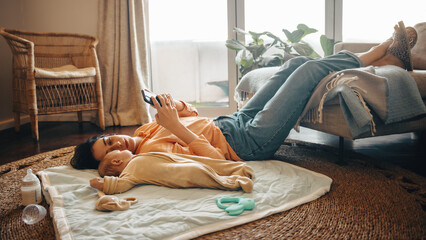 Mother and baby relax together at home quietly