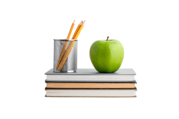 Pencil holder with yellow and pink pencils next to green apple on stack of textbooks, isolated on a transparent background