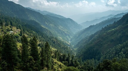 Fototapeta premium Serene mountain valley unfolds with lush green forests and distant mist filled peaks creating a breathtaking natural panorama
