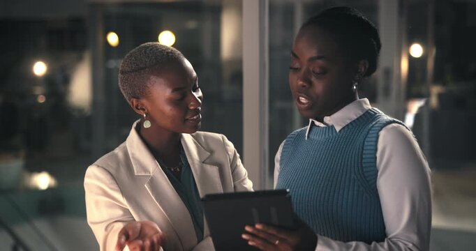 Night, executive and woman with tablet in office, feedback meeting and tips to edit investment proposal. Overtime, manager and people with tech in workplace, ideas and advice for finance presentation