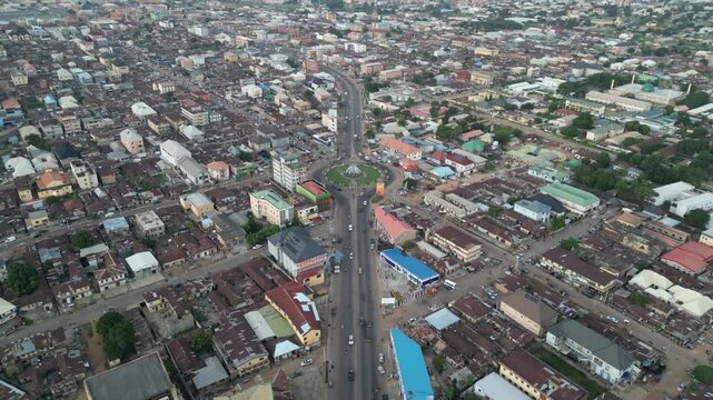 Aerial view of Ahmadu Bello Way showcases a bustling cityscape with a long road cutting through buildings, Kaduna, Kaduna, Nigeria.