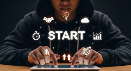 Hooded Figure Using Tablet with Glowing “START” Icons Representing Digital Innovation