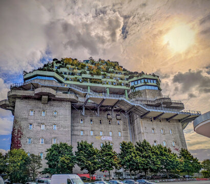 Hamburg, Germany - September 22, 2025: Der Bunker in Hamburg St.Pauli, umgebaut zum st&auml;dtebaulichen historischen Denkmal mit Dachgarten und &ouml;ffentlich zug&auml;nglichen Wegen,im Gegenlicht.