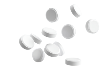 Scattered white round pills